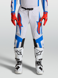 Alpinestars Supertech Vesta, pantalones de motocross para hombre, blancos y rojos con detalles azules, diseño atlético elástico y perforaciones para ventilación
