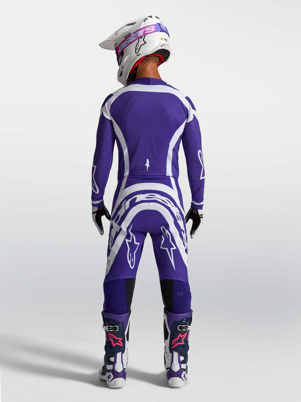 Alpinestars Supertech Vesta, pantalones y jersey de motocross para hombre, azul y blanco, vista trasera, equipo de carreras