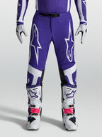 Alpinestars Supertech Vesta, pantalones de motocross para hombre, azul y blanco, ajuste atlético con tejido rip-stop.
