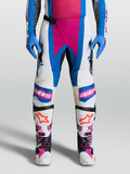 Alpinestars Techstar Maven, pantalones de motocross blancos y azules con detalles coral y paneles de cuero en las rodillas