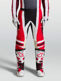 Alpinestars Techstar Maven, pantalones de motocross rojos y blancos, ajuste atlético con refuerzos de cuero en las rodillas y paneles ventilados para carreras todoterreno.