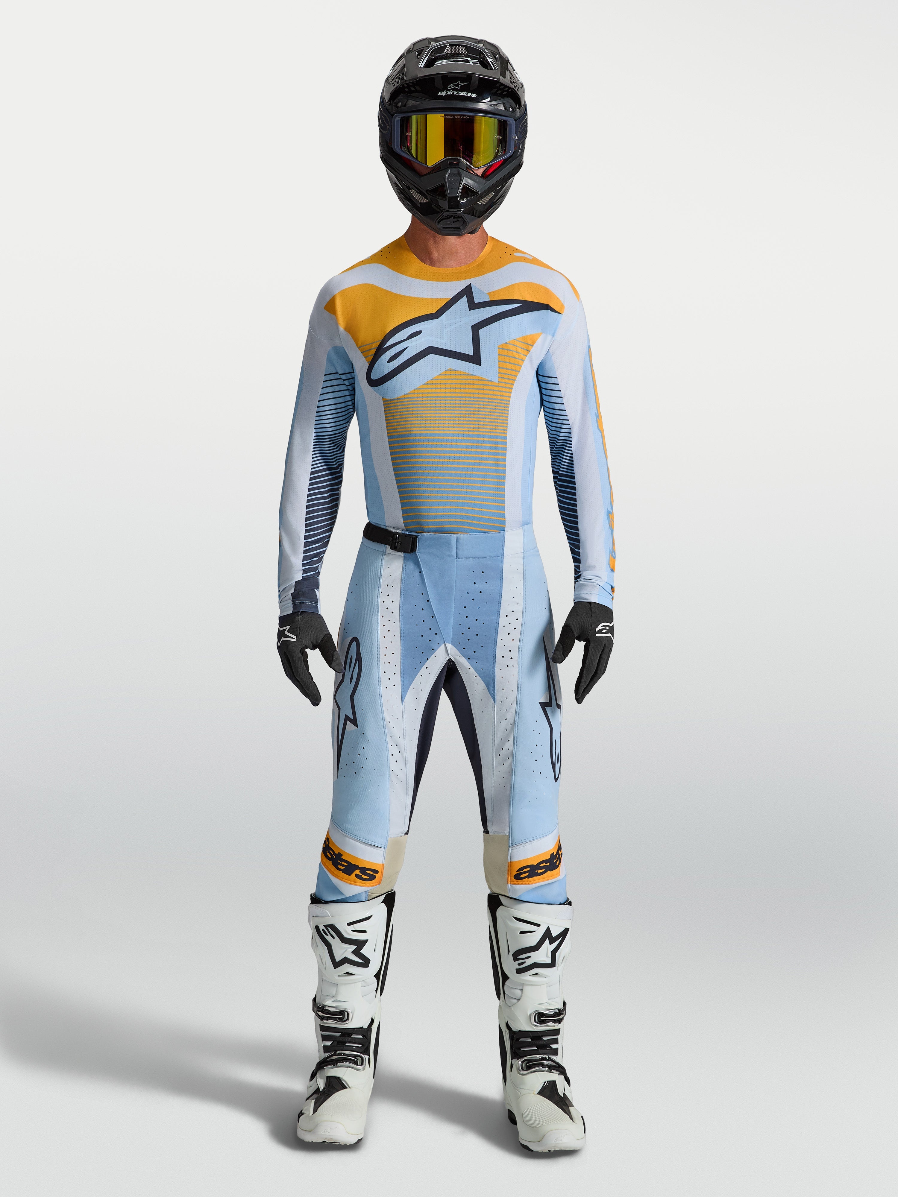 Alpinestars Techstar Maven, pantalones de motocross para hombre, azul y naranja, ajuste de carrera con zonas elásticas