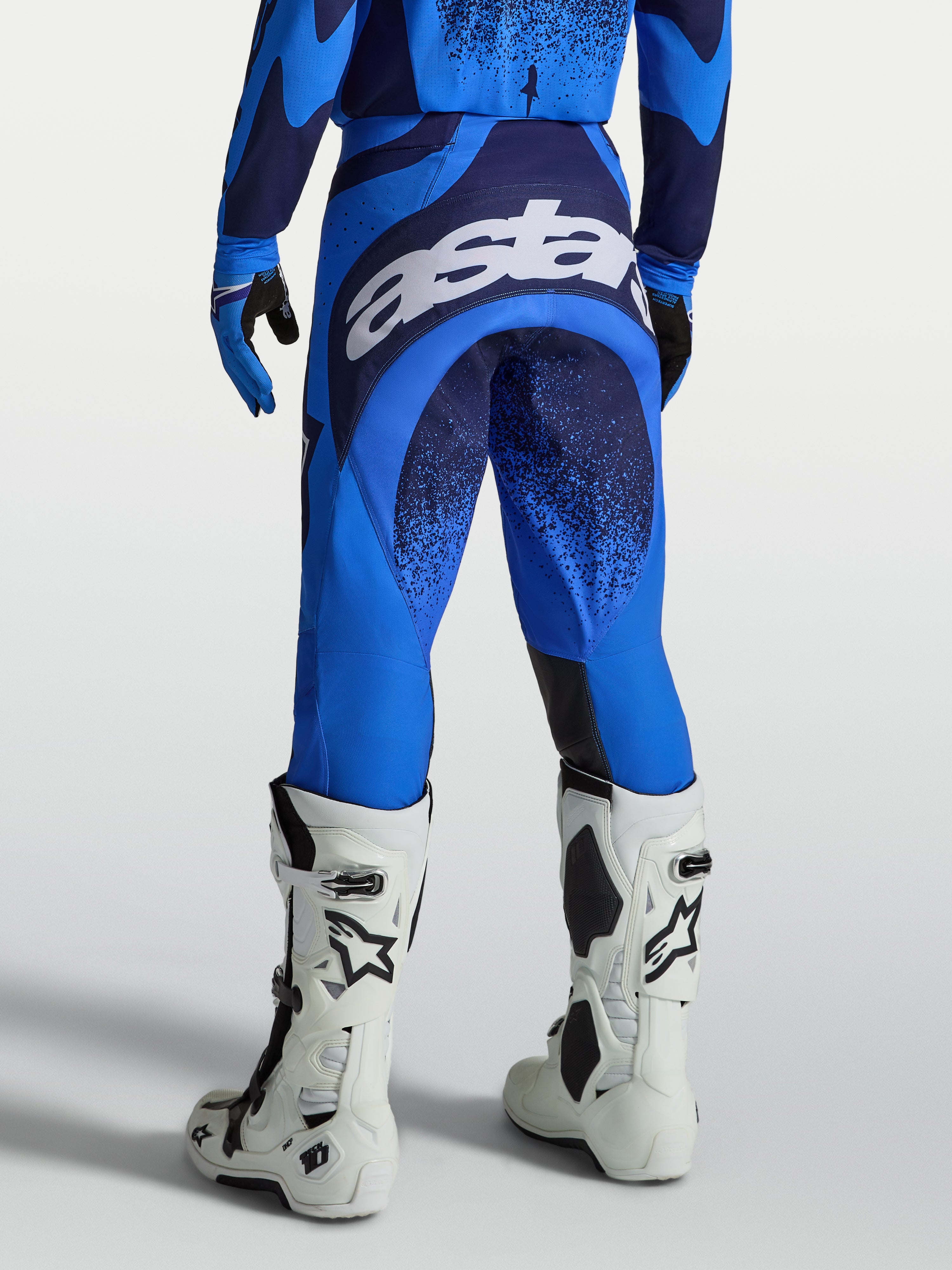 Alpinestars Techstar Swan, pantalones de motocross para hombre, azul UCLA y azul profundo, con logo blanco en el asiento.