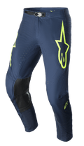 Pantalones Alpinestars Supertech Bruin 2023, pantalones de motocross, azul marino noche y amarillo flúor, con paneles de rodilla reforzados en negro, ventilación perforada y hebilla magnética ajustable en la cintura, diseño de competición duradero