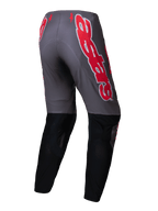 Alpinestars Pantalones Supertech Lipan 2025, pantalones de motocross para hombre, gris y rojo brillante con parte inferior de las piernas en negro, vista trasera