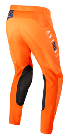 Alpinestars Supertech Foster Pants, pantalones de motocross en color naranja, con paneles interiores de las rodillas en negro, logotipo de ASTARS en blanco y azul en la pierna, construcción avanzada con tejido rip-stop elástico, vista lateral trasera
