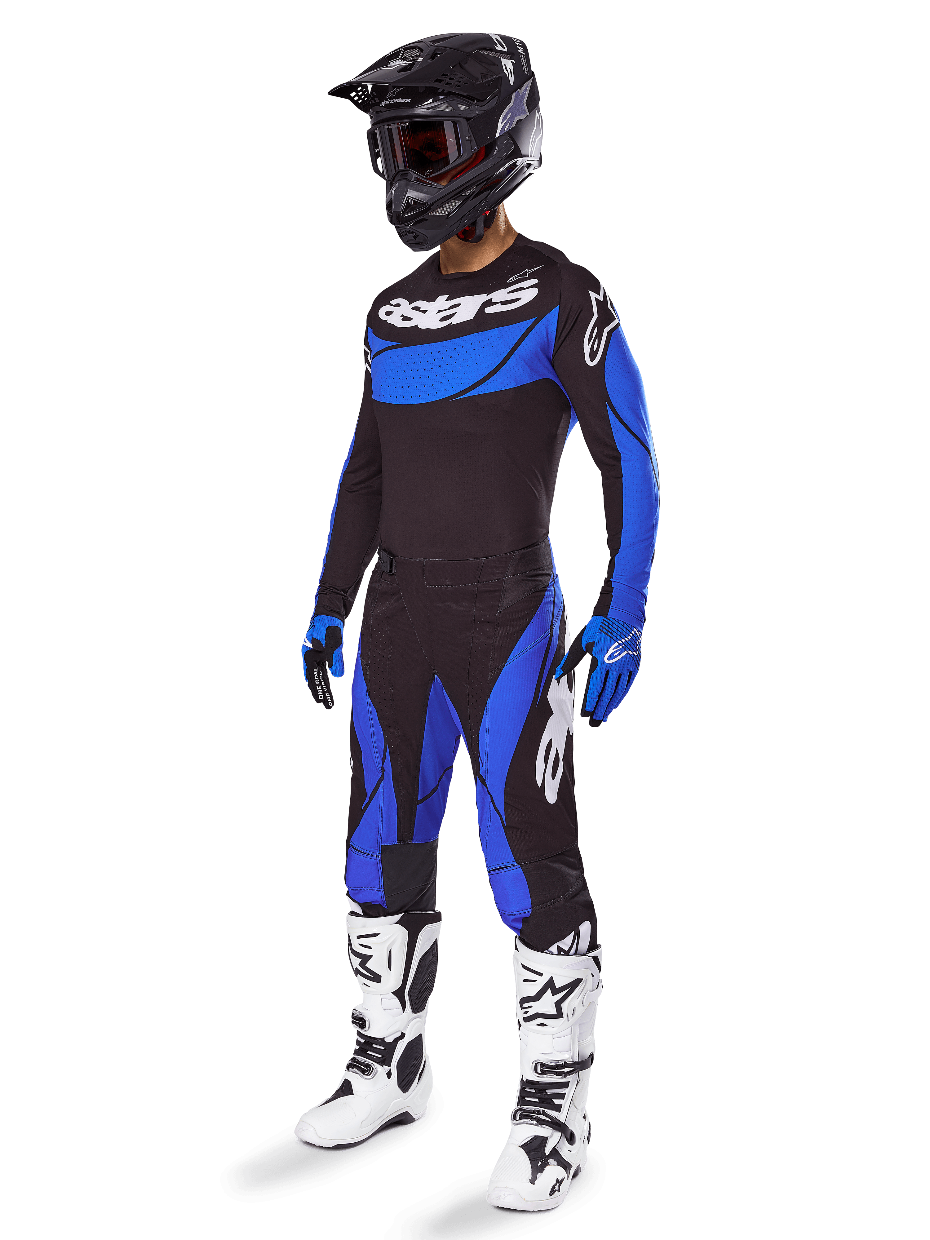 Alpinestars 2025 Techstar Dreem Gear Set, conjunto de equipo de motocross en negro y azul, incluye jersey y pantalones con logotipos en blanco, usado con casco negro, guantes azul y negro, y botas blancas y negras, traje de carreras coordinado completo para rendimiento off-road.