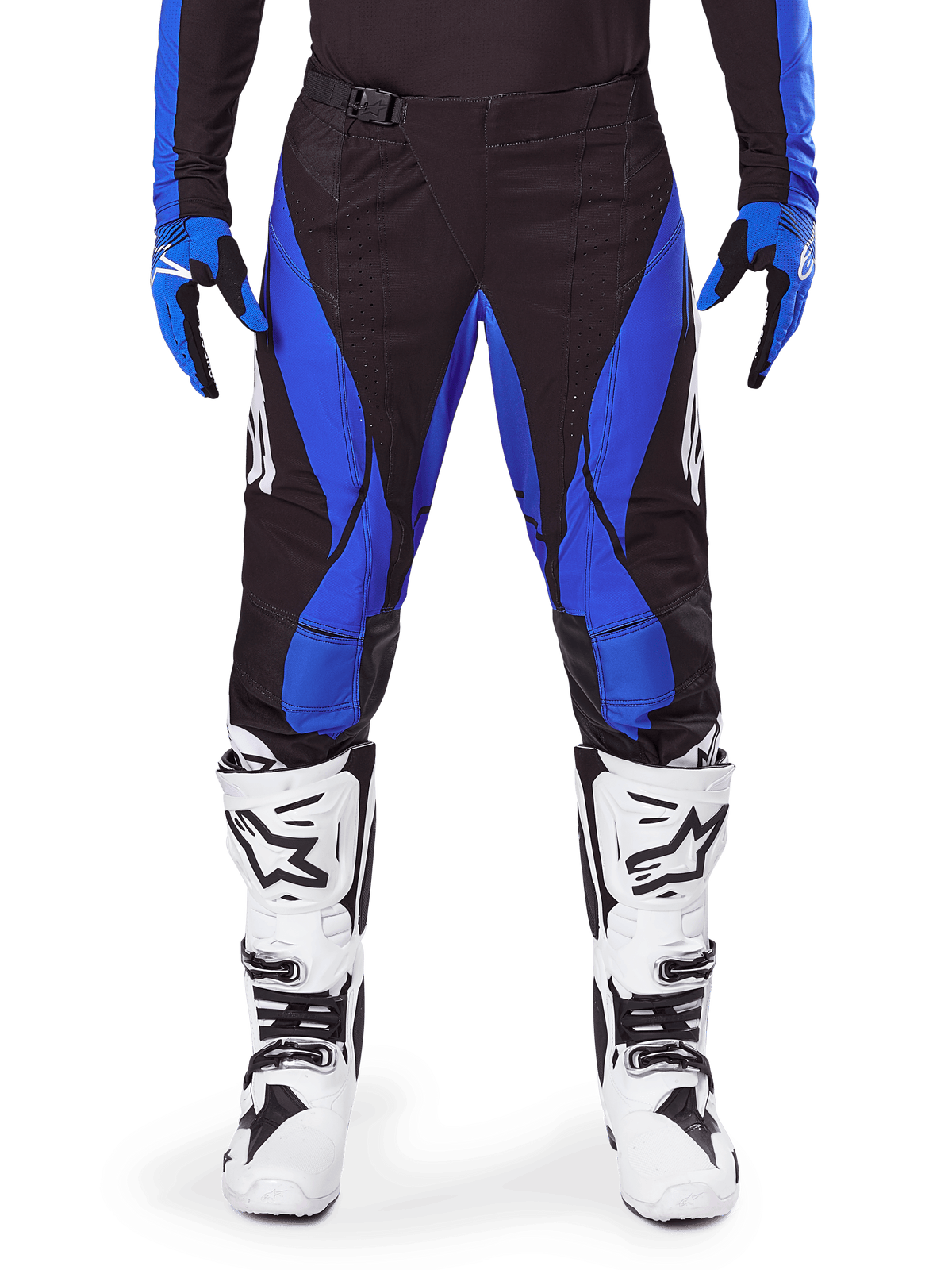 Alpinestars 2025 Techstar Dreem Pants, pantalones de motocross, negros y azules, usados con jersey, guantes a juego y botas blancas, con paneles laterales azules y ajuste atlético de competición, material resistente para carreras off-road