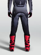Alpinestars Racer Amber, pantalones de motocross para hombre, grises, duradero tejido de poliéster 600D, vista trasera.