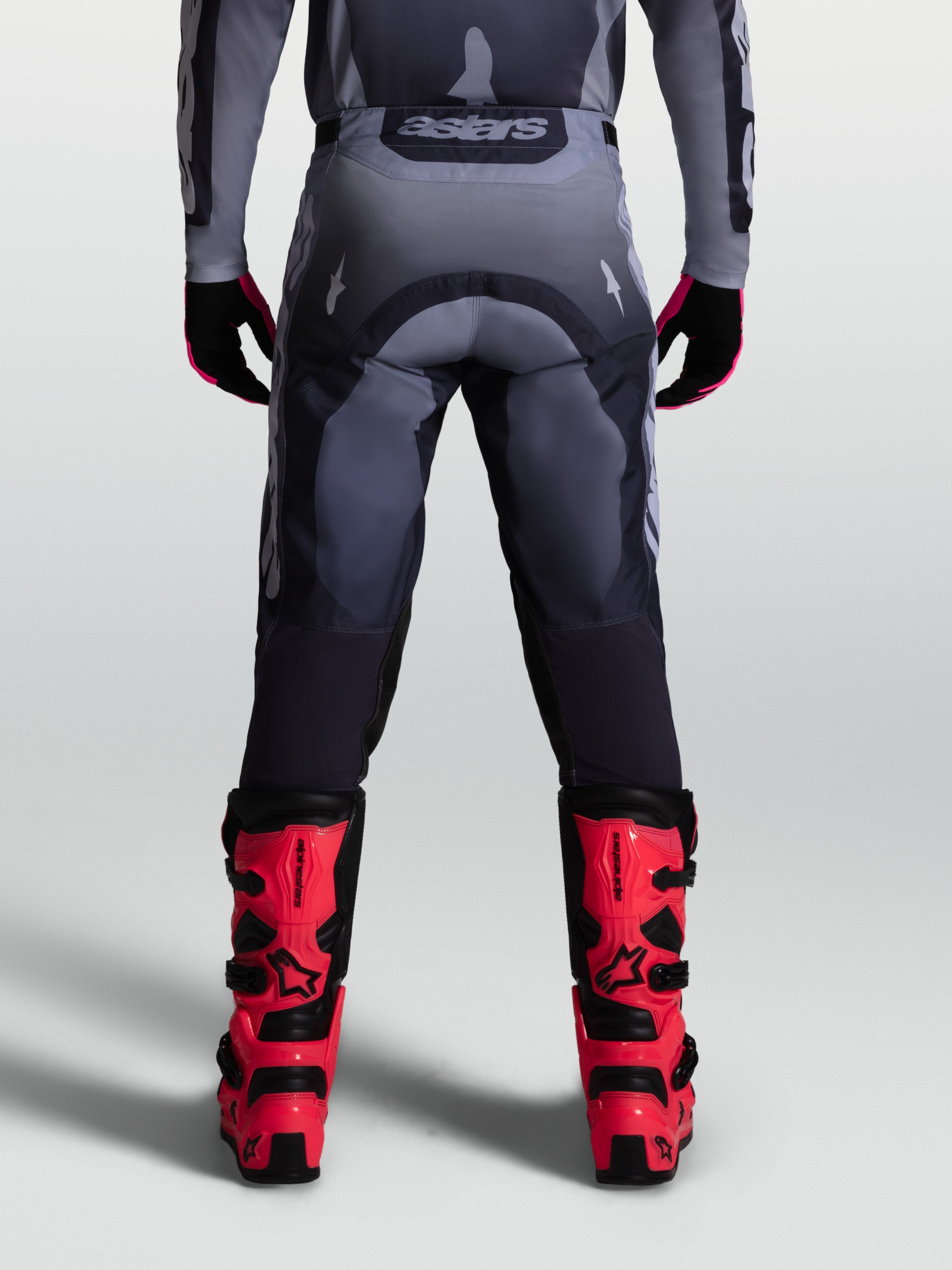 Alpinestars Racer Amber, pantalones de motocross para hombre, grises, duradero tejido de poliéster 600D, vista trasera.