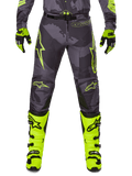 Alpinestars 2025 Racer Hollow Pants, pantalones de motocross, gris oscuro con detalles amarillo neón, diseños de estrellas amarillas brillantes, equipo de protección para todoterreno, estilo deportivo con alta visibilidad