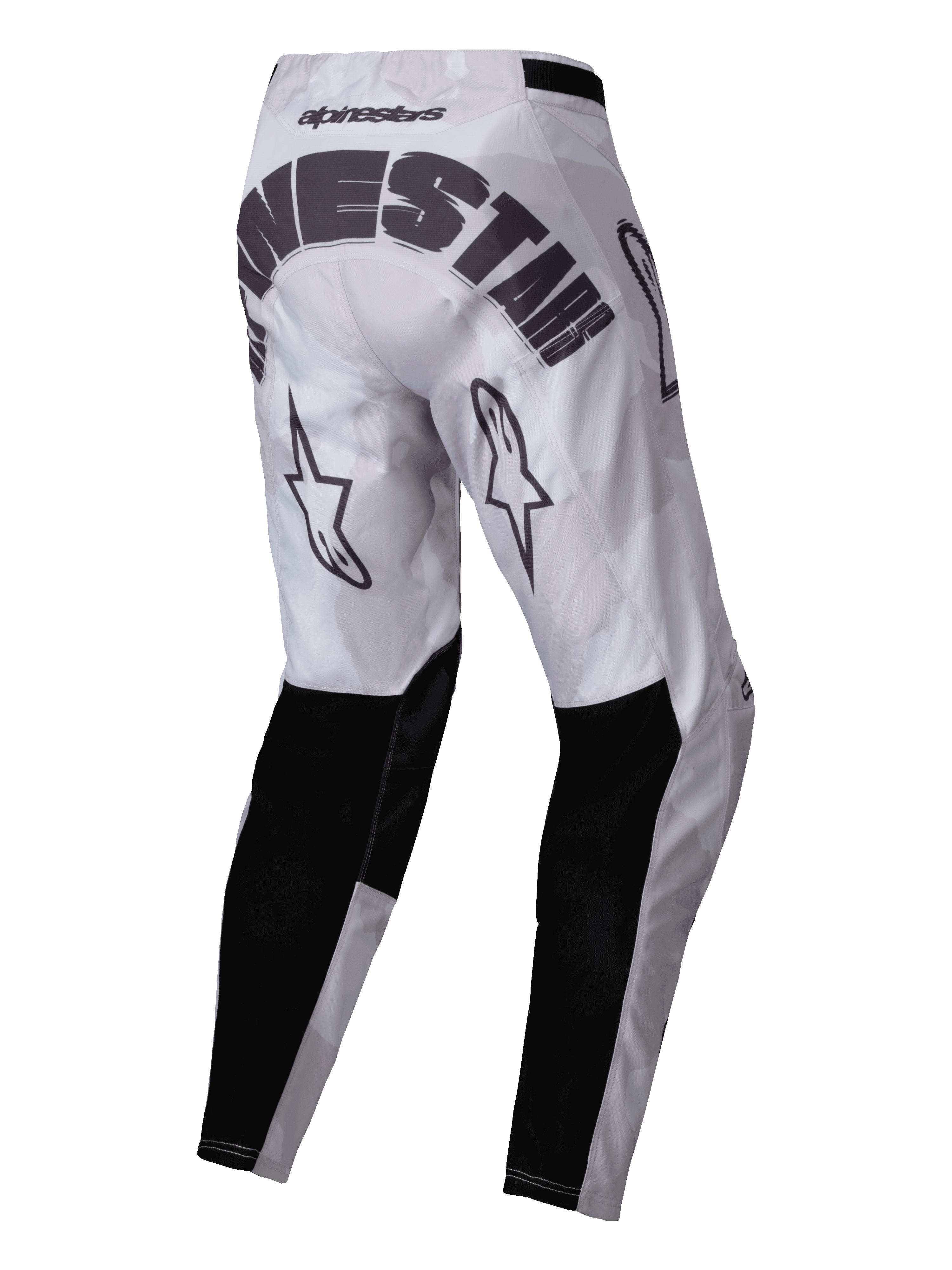 Alpinestars 2025 Racer Hollow Pants, pantalones de motocross, marrón camuflaje claro, vista posterior con la marca Alpinestars en negro en el asiento, logotipos de estrellas en la parte trasera de los muslos y paneles reforzados negros en la parte inferior de las piernas, diseño deportivo para todoterreno con un patrón de camuflaje gris claro