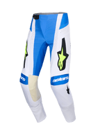 Alpinestars Techstar Knif Pants 2026, pantalones de motocross, azul Ucla, blanco y amarillo flúor, con un gran logo de estrella negra y detalles en amarillo flúor, marca astars en las rodillas, paneles perforados para ventilación, diseño deportivo para carreras todoterreno