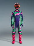 Alpinestars 2026 Techstar Nomur Gear Set, Motocross Racing Outfit, Vibrant Green Purple and Pink, Large Star Logo on Chest and Thighs, Black Helmet with Pink and Yellow Accents, Bright Pink Boots, Professional Sporty Design