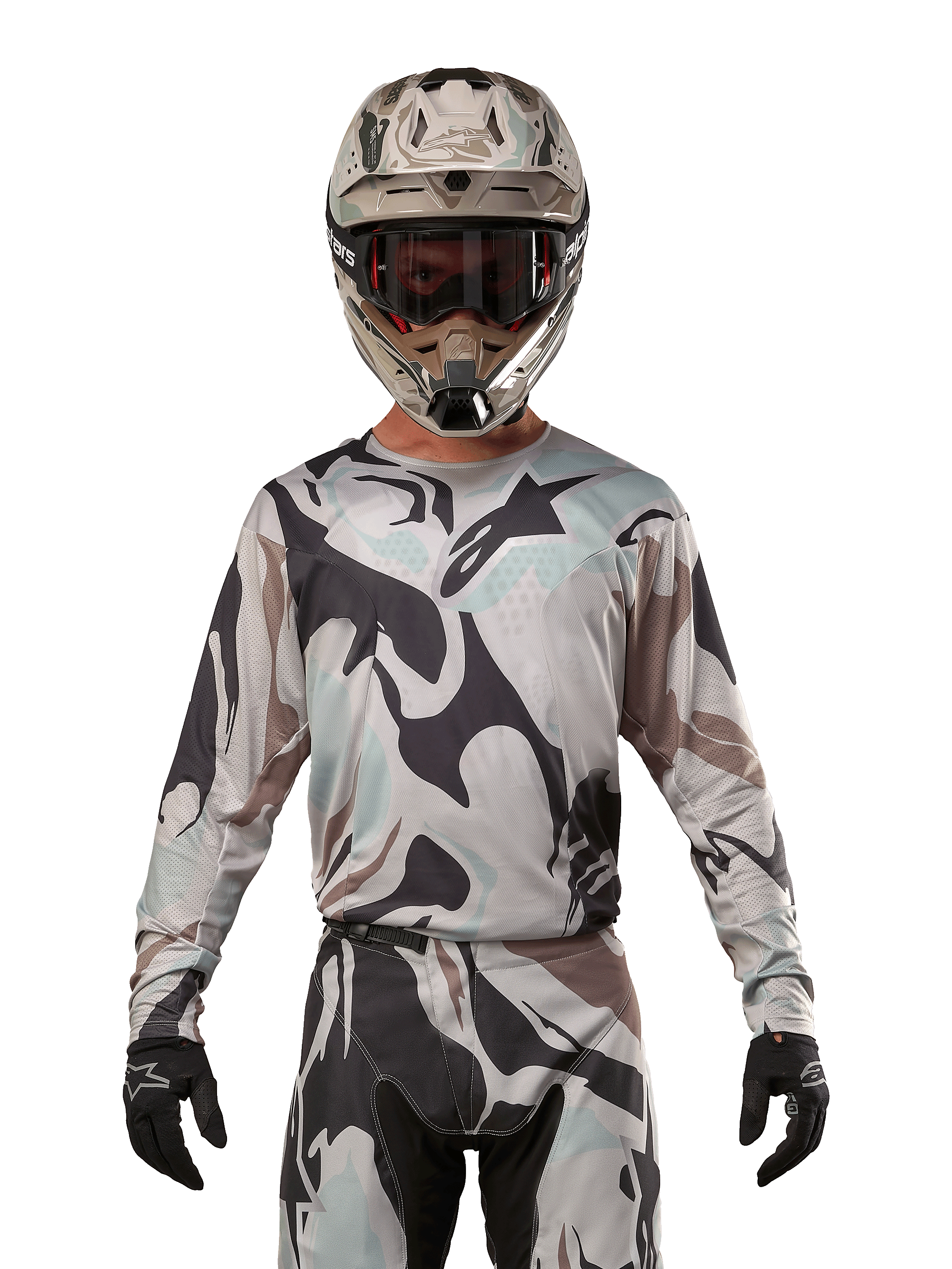 Alpinestars 2024 Racer Tactical Jersey, Motocross Jersey, Iron Camo Dust Gray camouflage pattern, rider wearing matching helmet and goggles with black gloves, technical gear for off-road racing