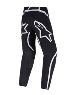 Alpinestars 2026 Fluid Apex Pants, pantalones de motocross, negro y blanco, vista trasera que muestra la marca de la gran estrella blanca en el asiento, diseño ergonómico con acentos blancos curvos, polifabric 600D duradero para rendimiento off-road