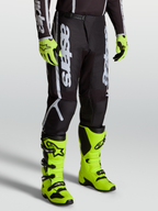 Pantalones Alpinestars Fluid Apex V2, negros y plateados, equipo de motocross para hombre con botas amarillas