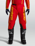 Alpinestars Fluid Apex V2 Pants, Men's Motocross pants in Red and Gold with durable 600D polyfabric reinforcement.
