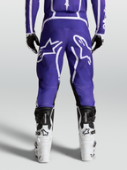 Alpinestars Fluid Apex V2, pantalones de motocross para hombre, azul y blanco, construcción de poli-tejido 600D, vista trasera