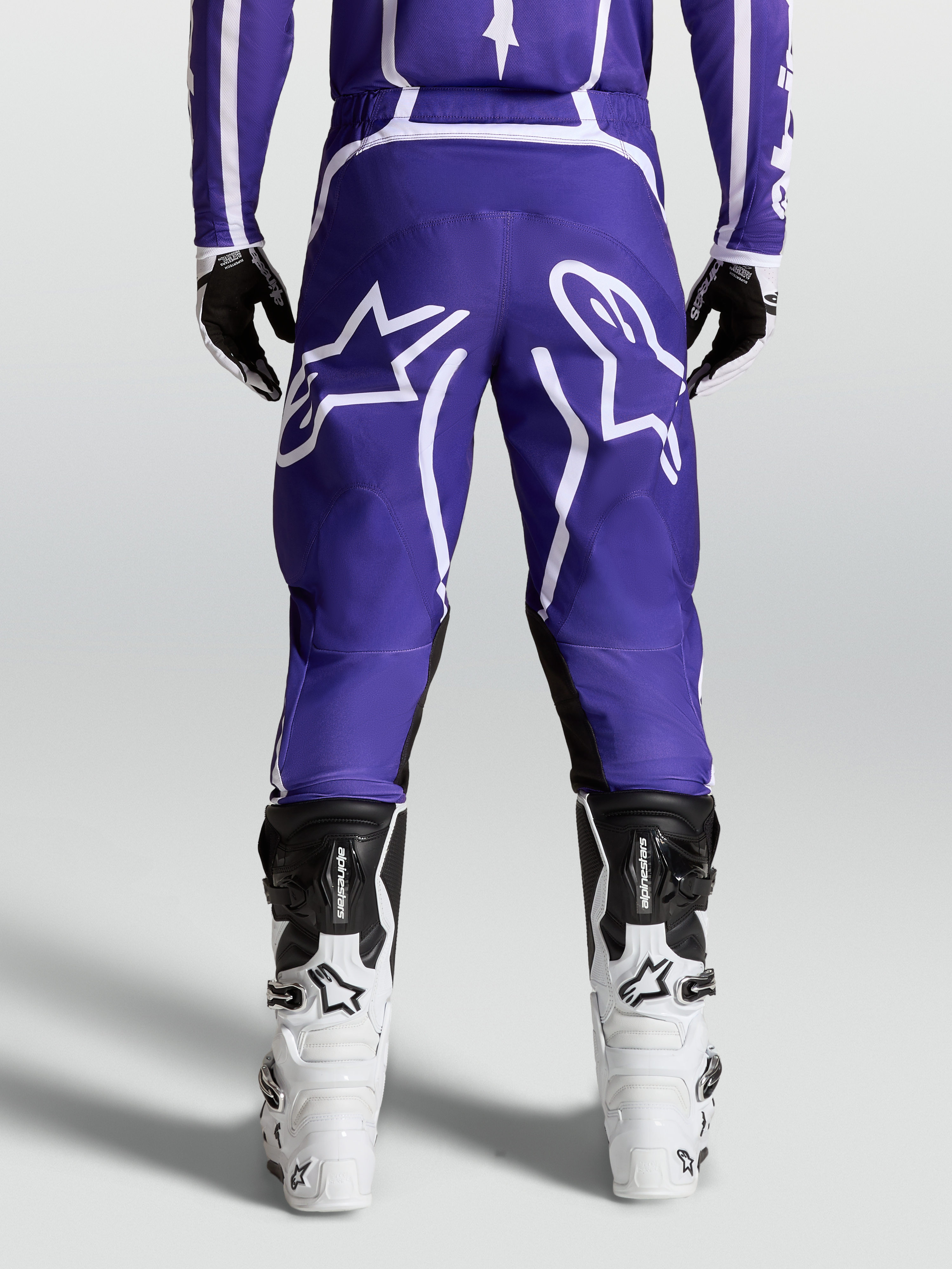 Alpinestars Fluid Apex V2, pantalones de motocross para hombre, azul y blanco, construcción de poli-tejido 600D, vista trasera
