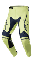Alpinestars 2023 Racer Hoen Pants, pantalones de motocross en Night Navy y Fluorite Green, con grandes logotipos de estrellas en los muslos, parches de cuero negro en el interior de las piernas, construcción ergonómica precurvada y cierre de trinquete ajustable en la cintura.