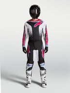 Alpinestars pantalones Fluid Drag para hombre, pantalones de motocross en negro, blanco y rojo fluo con ajuste ergonómico.