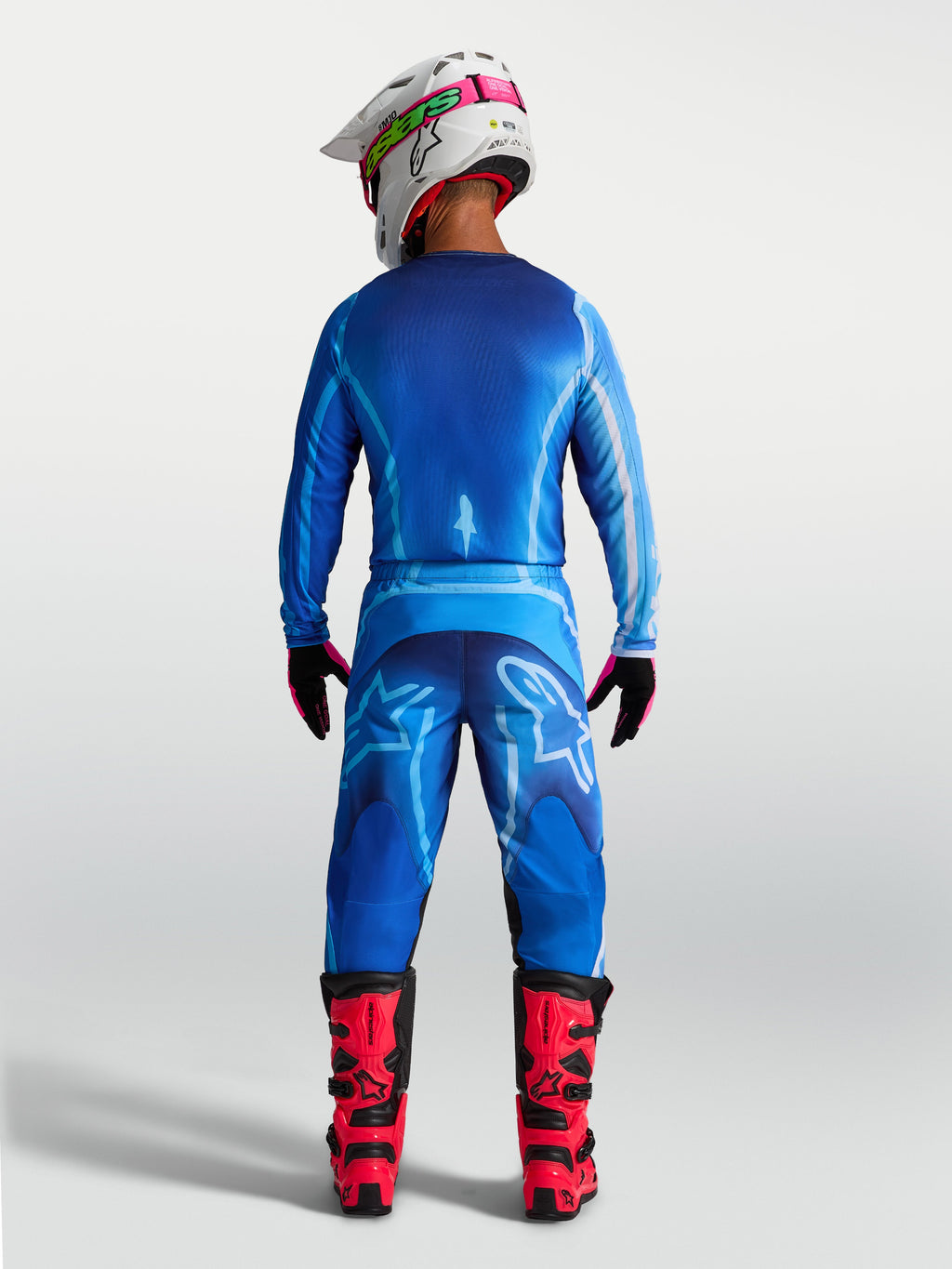 Alpinestars Fluid Kepler, pantalones de motocross para hombre en azul, vista trasera con ajuste ergonómico de politejido