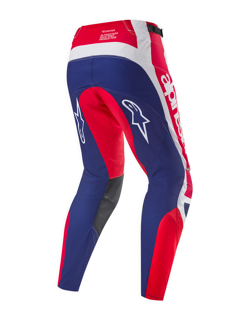Pantalones Alpinestars Techstar Fortitude Edición Limitada, pantalones de motocross, rojo brillante, blanco y azul, vista trasera que destaca los paneles ergonómicos de competición, logotipos de Alpinestars en blanco y paneles interiores de las rodillas en gris oscuro.