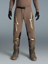 Pantalones Alpinestars Supertech Air Gold, motocross para hombre, marrones y dorados, con tejido rip-stop ventilado.