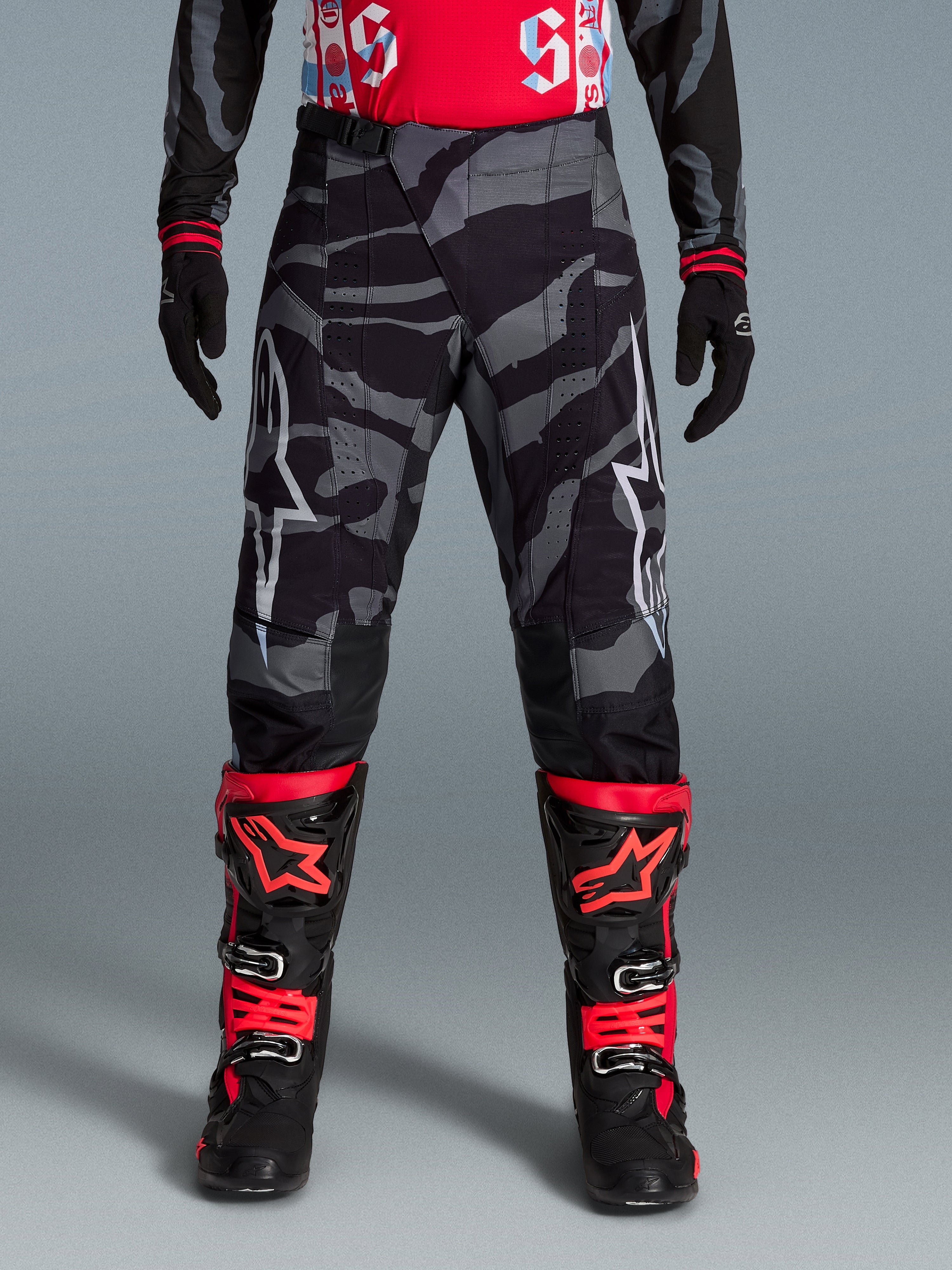 Alpinestars pantalones Techstar Beast Coast edición limitada, para motocross, negro y naranja con patrón de camuflaje
