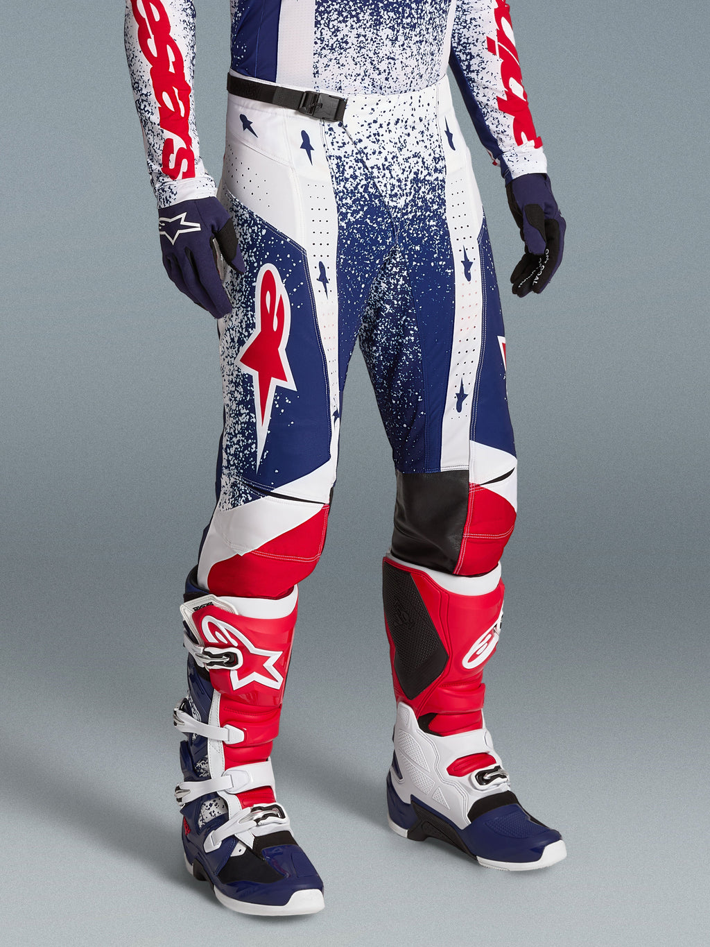 Alpinestars Limited Edition Techstar Unity Gear Set, men's red, white, and blue motocross racing pants and performance boots.