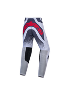 Alpinestars Supertech Swan Juvenil, pantalones de motocross grises y rojos con ajuste de competición y gran logo trasero