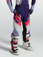 Pantalones Alpinestars Supertech Dyna juvenil, para motocross en morado y rosa fluo con tejido rip-stop elástico