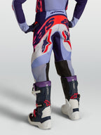 Pantalones Alpinestars Supertech Dyna Juvenil, equipo de motocross morado y rosa flúor con tejido rip-stop elástico duradero, diseño off-road para jóvenes pilotos