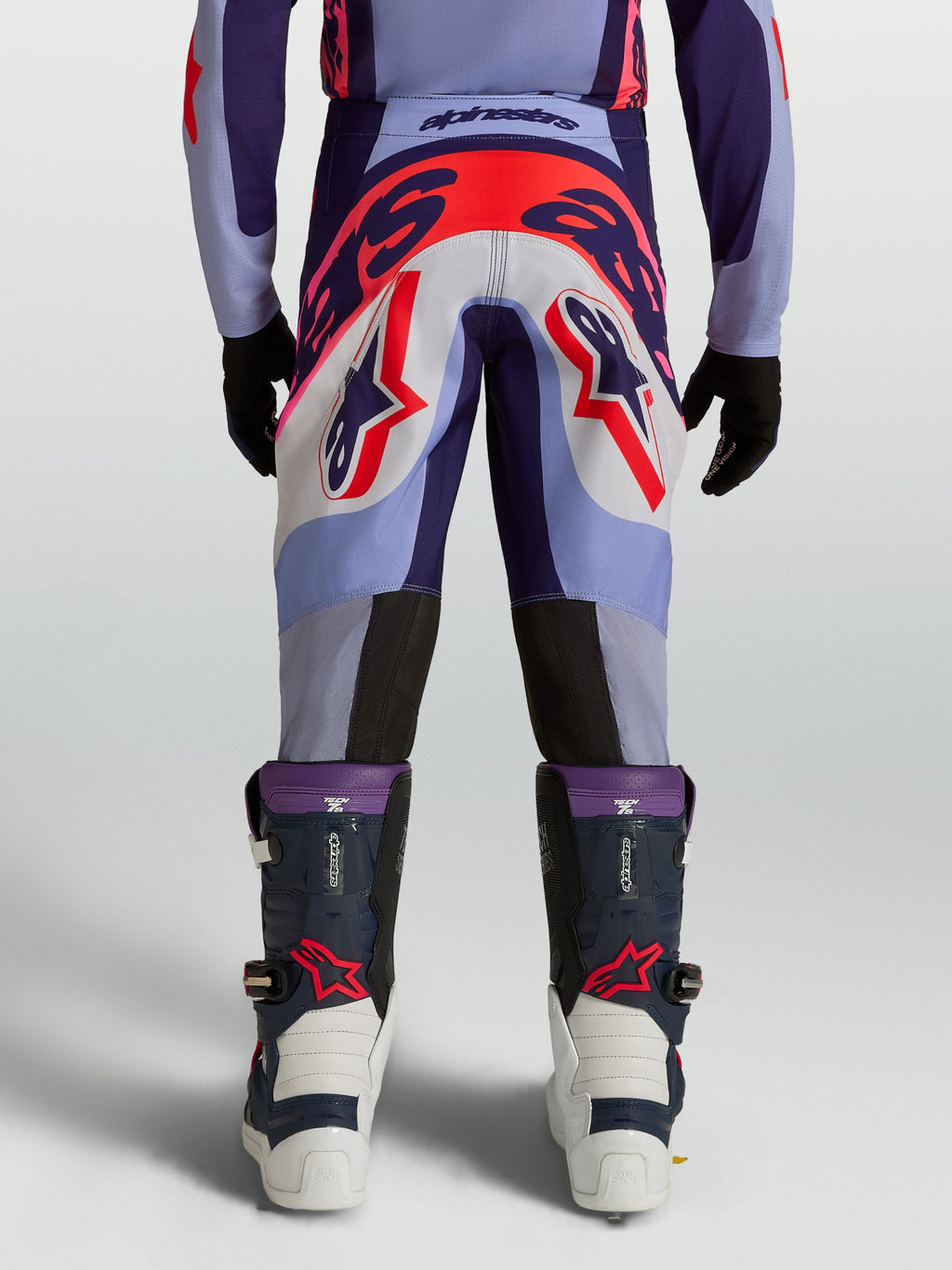 Alpinestars Pantalones Supertech Dyna Juvenil, pantalones de motocross morados y rosa flúor, ajuste atlético, vista trasera