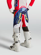 Alpinestars Supertech Dyna juvenil, pantalones de motocross rojo fuego y azul marino, vista trasera para jóvenes