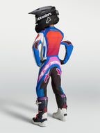 Alpinestars Youth Supertech Maven Pants, motocross racing gear in white and hot coral, seen on model from the back.