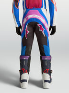 Alpinestars Youth Supertech Maven Motocross Pants in Blue and Hot Coral, featuring a reinforced seat and athletic fit.
