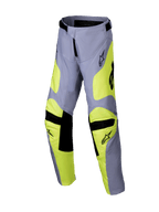 Alpinestars 2025 Youth Racer Veil Pants, pantalones de motocross juveniles, gris y amarillo flúor, detalles negros en las rodillas y la cintura, diseño deportivo con piernas precurvadas y logotipos, equipamiento duradero para carreras off-road