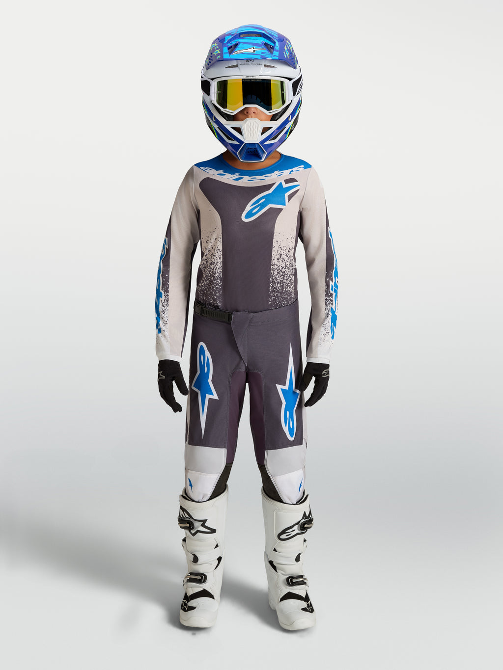 Alpinestars Pantalones Fluid Drag Juvenil, equipo de motocross para niños, gris y azul, construcción de polifabric duradero con botas blancas