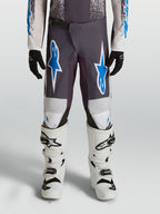 Alpinestars Fluid Drag juvenil, pantalones de motocross, gris y azul, politejido 600D con rodillas reforzadas