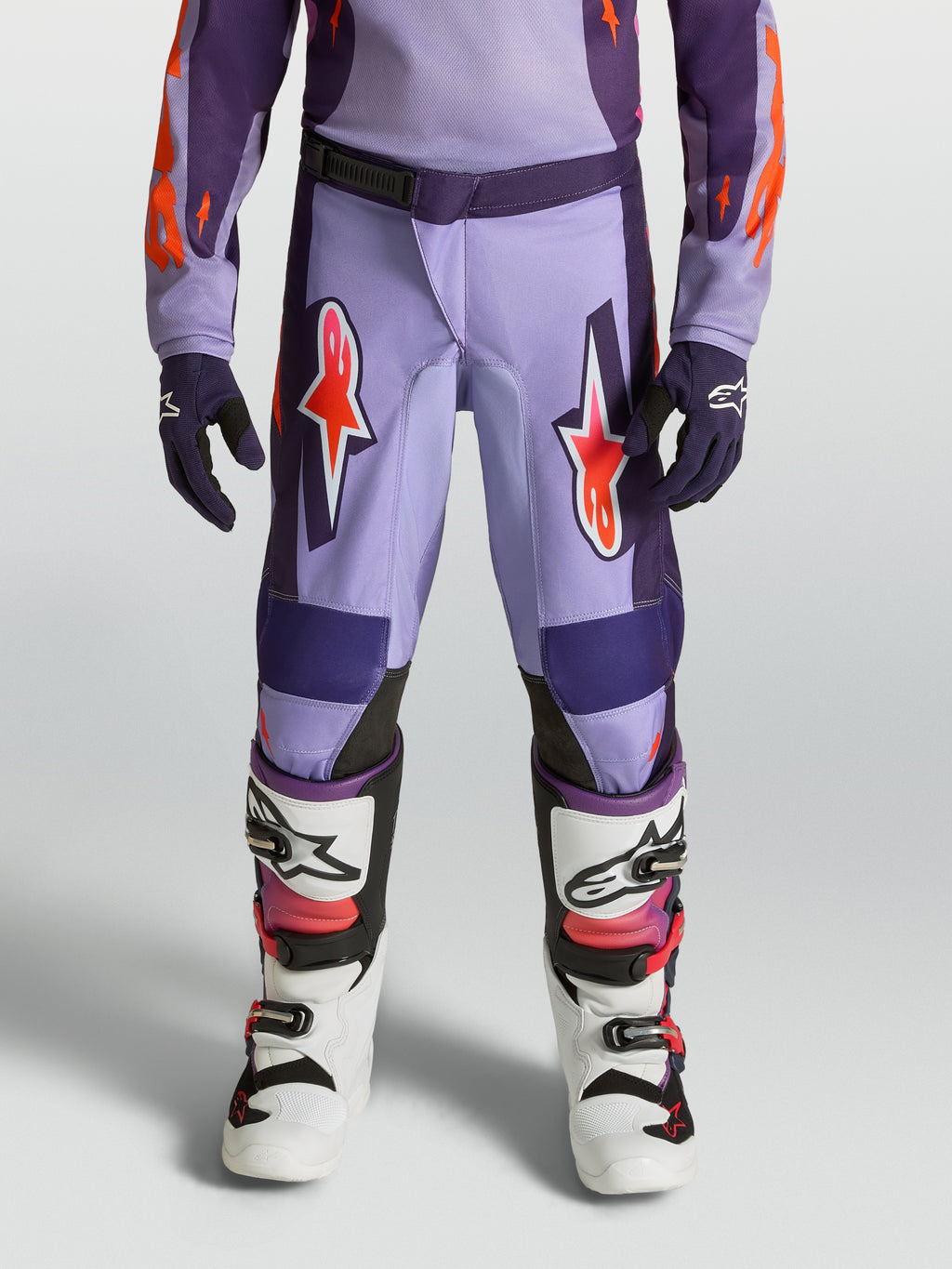 Alpinestars Pantalones Fluid Hunt Juveniles, pantalones de motocross morados y rosa fluo, ajuste deportivo técnico.