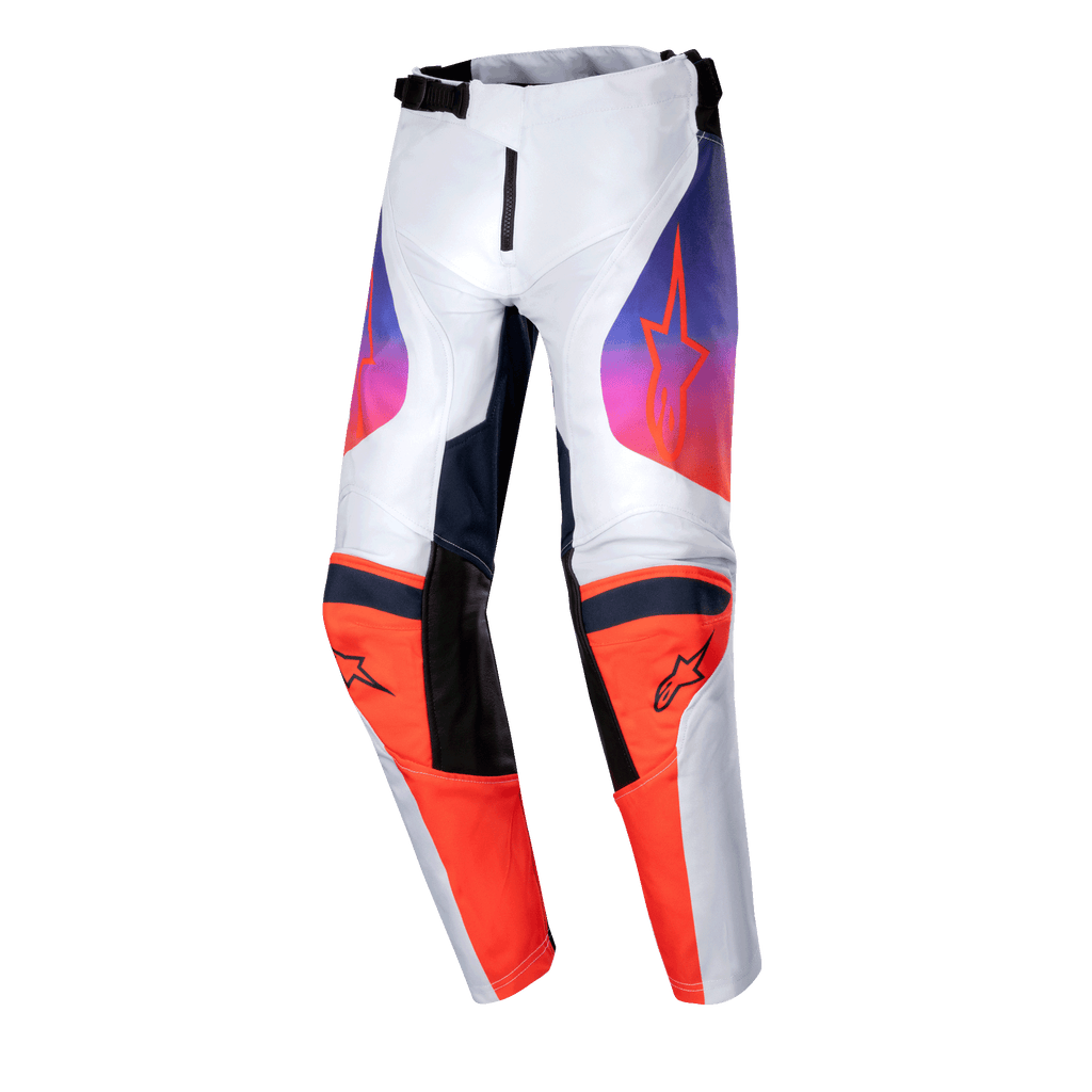 Alpinestars 2024 Youth Racer Hoen Pants, pantalones de motocross juveniles, gris claro, naranja vibrante y negro, con paneles de rodilla color naranja vibrante con logotipos negros y gráficos en los muslos con degradado de púrpura a naranja, diseño ergonómico precurvado para carreras fuera de carretera