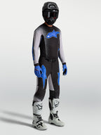 Alpinestars Supertech Hiten AFD, jersey y conjunto de motocross para hombre, negro y azul con botas blancas, equipo profesional de off-road