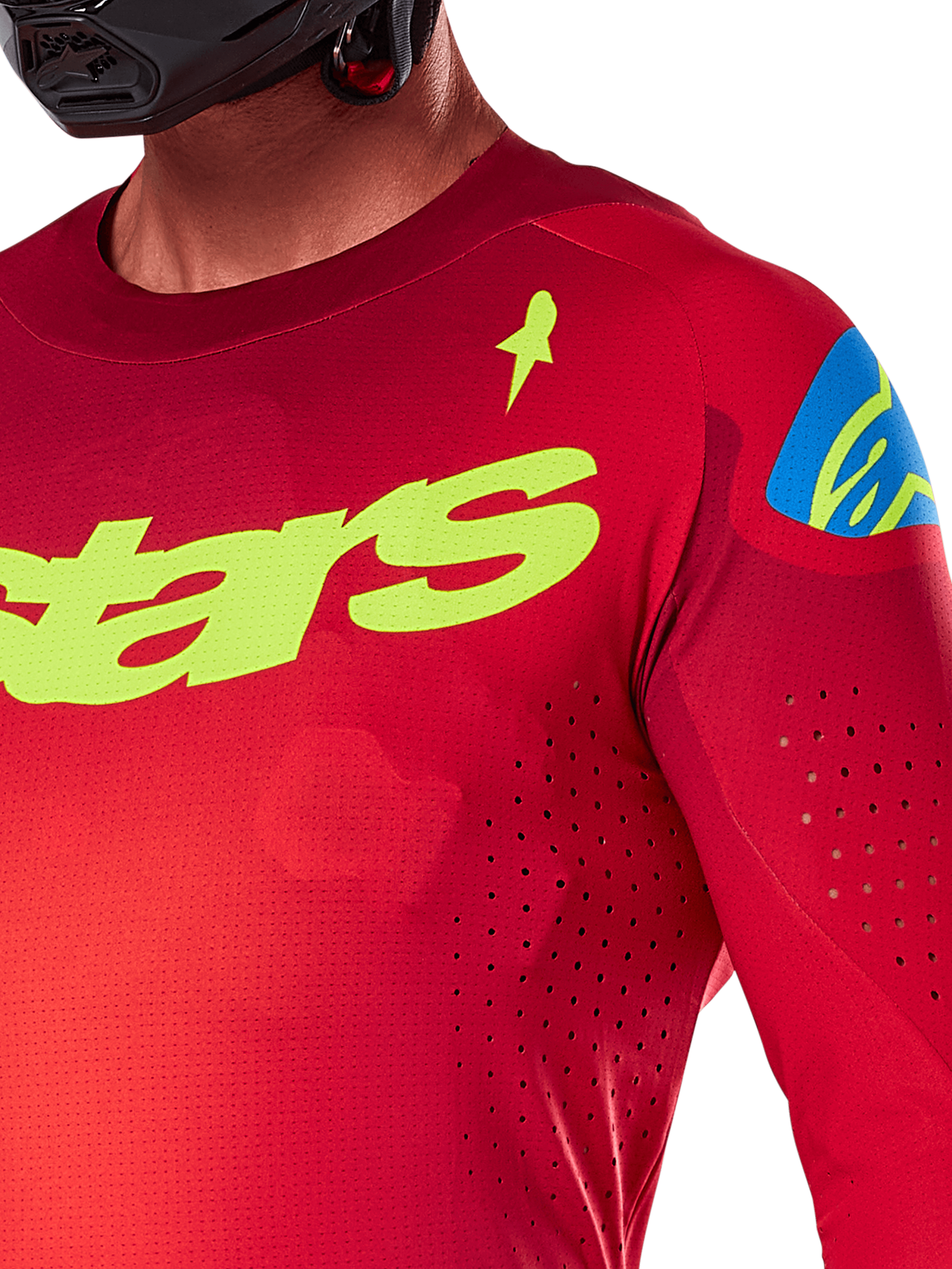 Alpinestars 2025 Supertech Maker Jersey, Motocross Jersey, Bright Red and Yellow Fluo, close-up view showing laser-cut perforations, yellow Alpinestars branding on chest, blue shoulder detail, breathable stretch mesh fabric