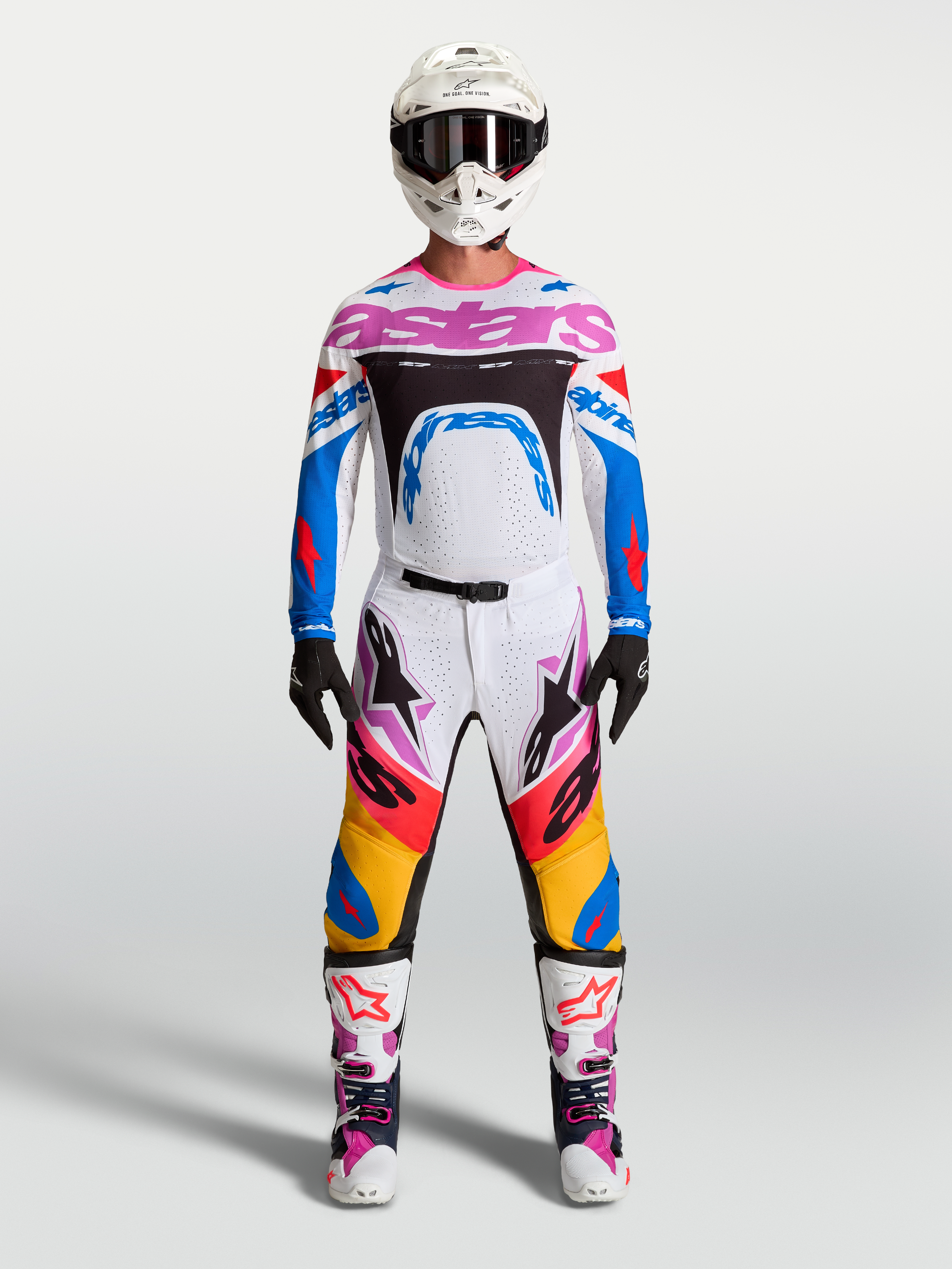 Alpinestars Supertech Dyna Gear Set y Jersey, conjunto de motocross para hombre, blanco y azul con acentos morados.