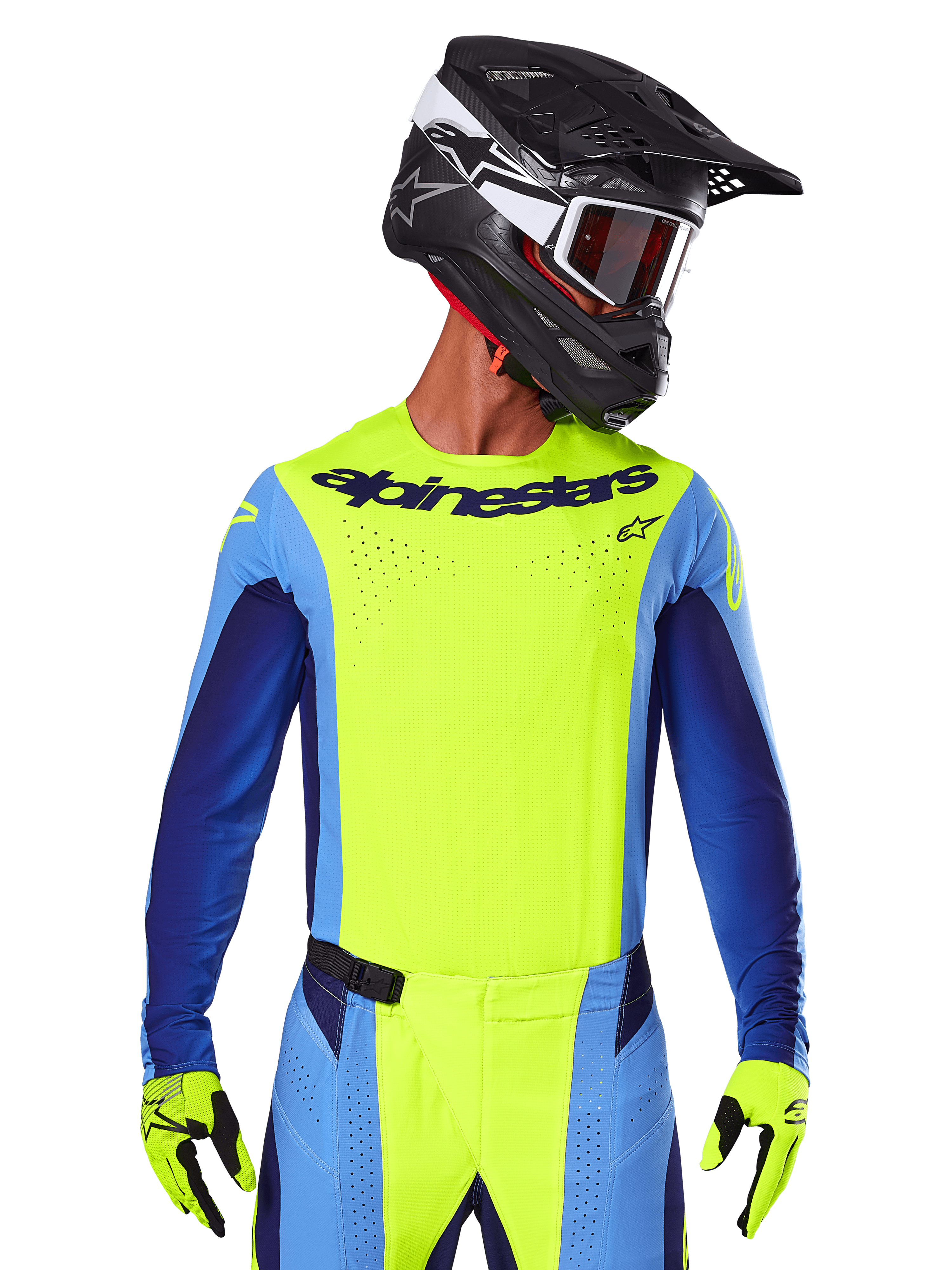 Alpinestars 2025 Techstar Melt Jersey, camiseta de motocross, amarillo flúor y azul, con ventilación cortada por láser y ajuste atlético de competición, usada por un piloto con casco negro y guantes amarillo flúor