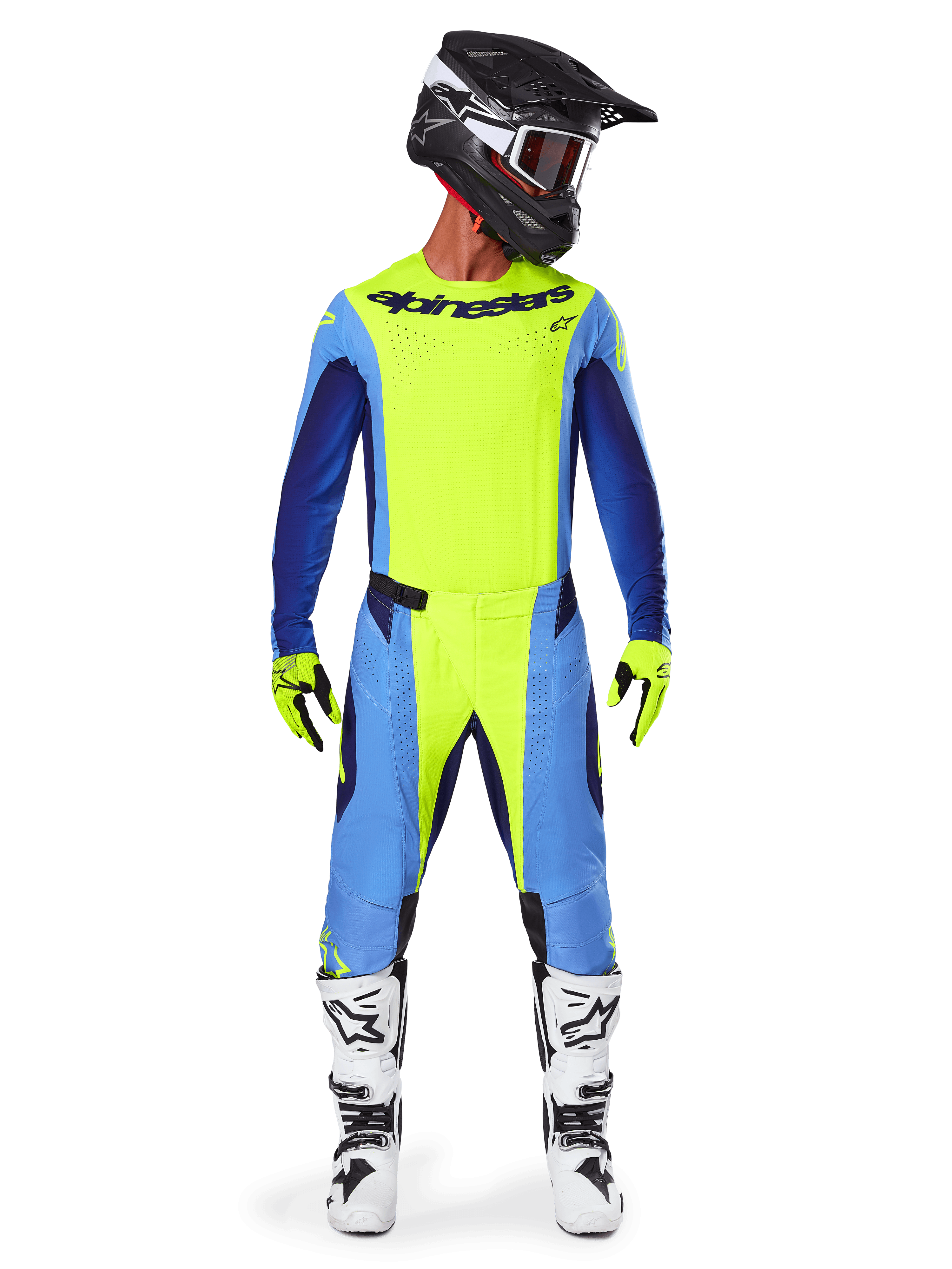 Piloto de motocross con equipamiento de competición completo, Jersey Alpinestars 2025 Techstar Melt en amarillo flúor y azul, pantalones de motocross a juego en amarillo y azul, casco negro con gráficos blancos y gafas, botas blancas y negras, guantes amarillos y negros, conjunto de alto rendimiento coordinado para carreras todoterreno