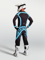 Alpinestars Supertech Vesta, jersey y conjunto de motocross, negro y turquesa, equipo profesional con ajuste elástico