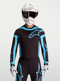 Jersey Supertech Vesta de Alpinestars, jersey de motocross para hombre, negro y turquesa con ventilaciones láser transpirables.
